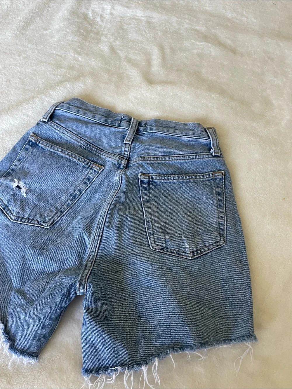 Agolde Riley Light Blue High-Rise Frayed Hem Cutoff Denim Shorts